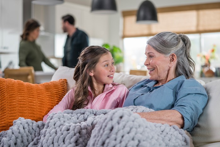 Grandma in conversation with her granddaughter